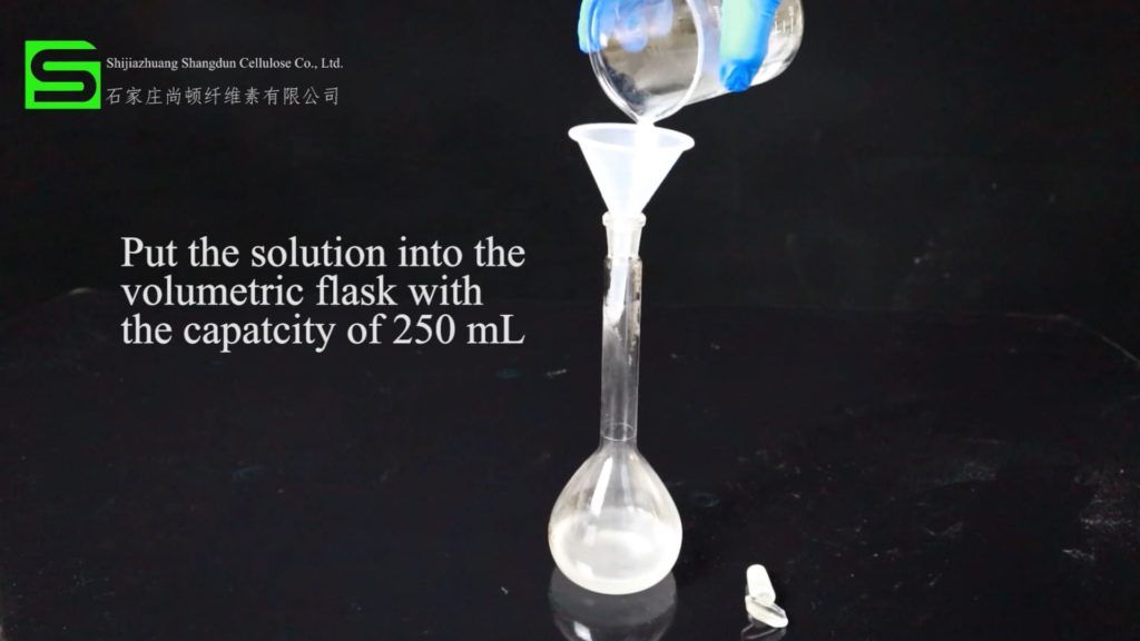 put the solution into the volumetric flask